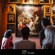 A group of people admiring different paintings at the Mauritshuis Museum’s Prince William the Fifth Gallery